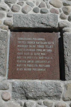 Hirsikankaan patsaan muistolaatta