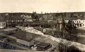 The assembly hall which housed the factory school, second building from left. It also served as a temporary church in the 1920s.