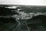 Lagus,  (c) UPM-Kymmene Photo Library Division and Unit,  Jämsänkoski mill area photographed from the south side in 1928. In the foreground Jämsänjoki river and the mill harbour area. Photo Lagus.