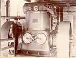   The Westinghouse steam engine, nicknamed Jumbo, that powered the hollander section of Hovilanhaara paper mill with machine supervisor M. Rolig.